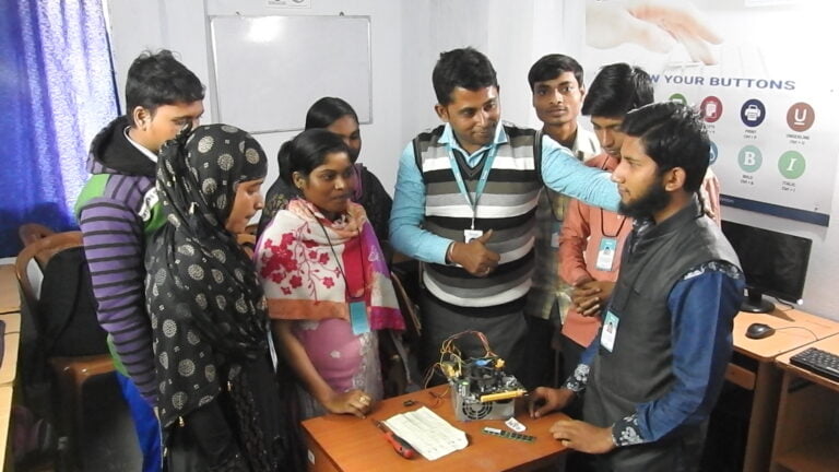 Students participating in practical sessions for hardware and networking course